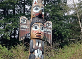 totem pole forest art woodcarving