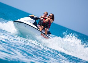 aerial of people driving jet ski jetski