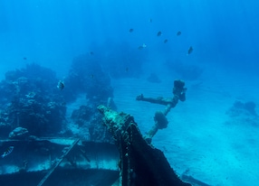 wreck site sunken airplane or ship in caribbean blue water